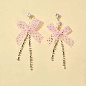 * 2 for $5 * NWT ROMWE polka-dot bow drop earrings.
